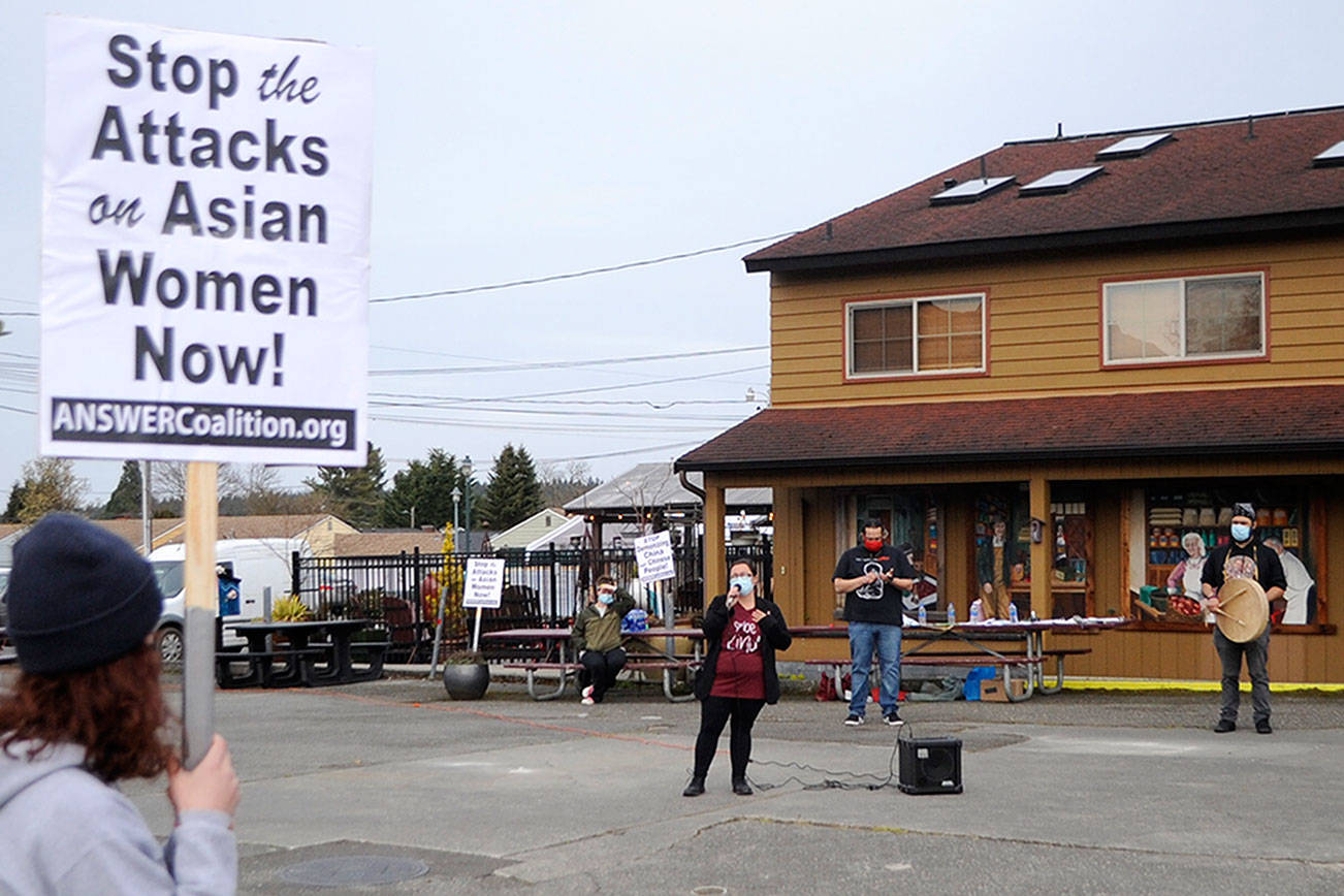 Rachel Anderson of Sequim speaks to a crowd of about 30 people about how she supports the Asian American community and how attacks on women need to stop. (Matthew Nash/Olympic Peninsula News Group)