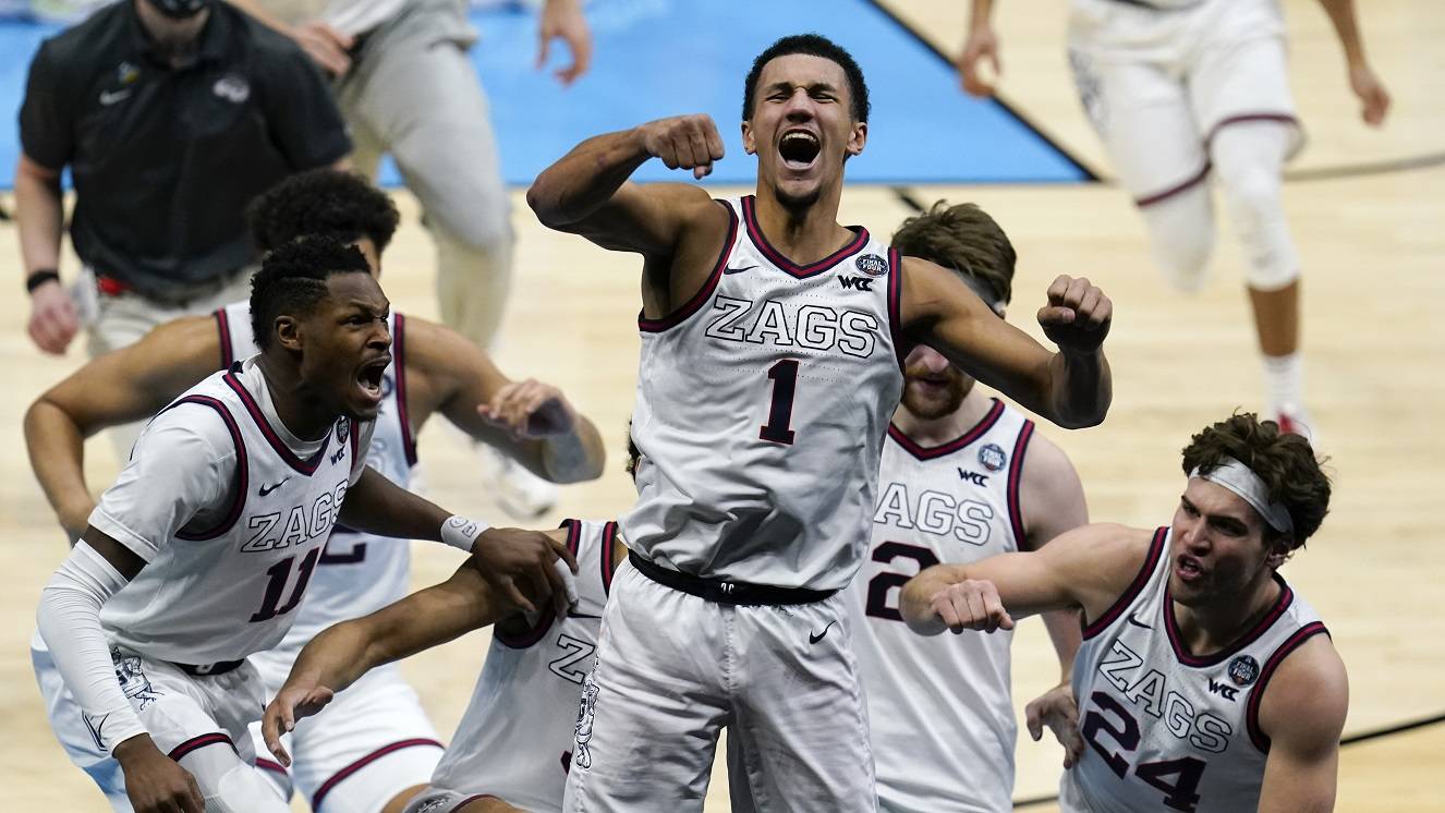 Gonzaga guard Jalen Suggs (1) celebrates making the game winning basket against UCLA during overtime in a men’s Final Four NCAA college basketball tournament semifinal game, Saturday, April 3, 2021, at Lucas Oil Stadium in Indianapolis. Gonzaga won 93-90. (AP Photo/Michael Conroy)