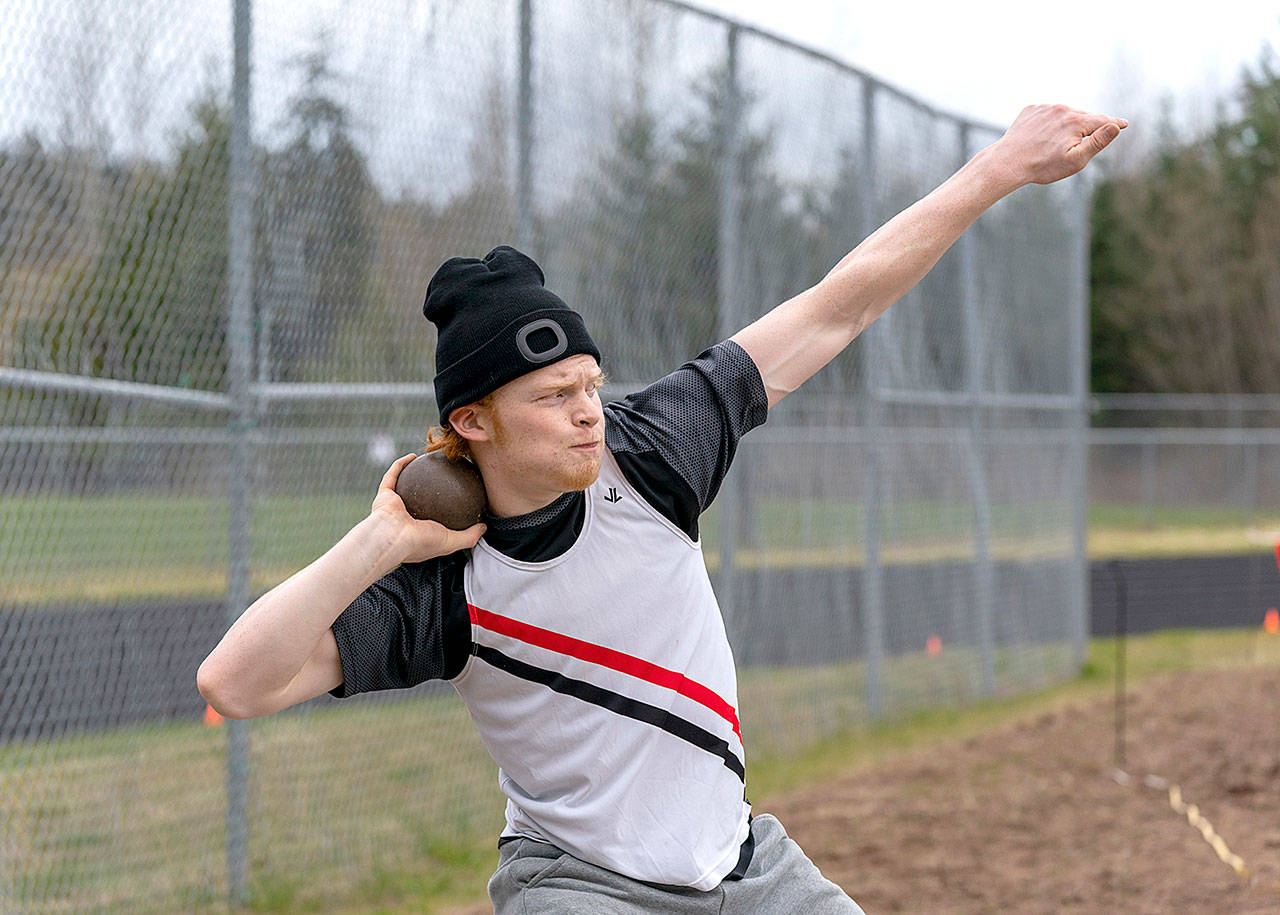East Jeffersons Gage Berry puts the shot a personal best of 35 feet, 7 inches during a meet Saturday at Blue Heron Middle School against the Klahowya Eagles. Gage finished second to teammate Anson Jones, who went 37-4 1/2. (Steve Mullensky/for Peninsula Daily News)