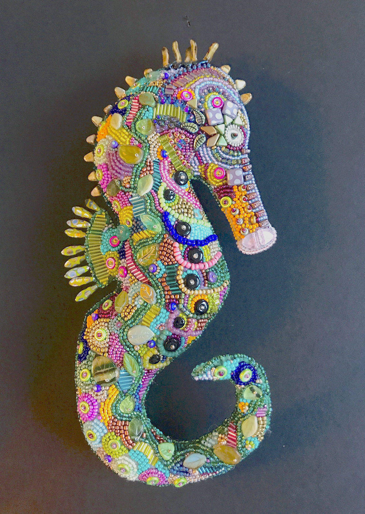 “Seahorse,” by Pat Herkal is among the textile artworks on display at the Northwind Art Grover Gallery.