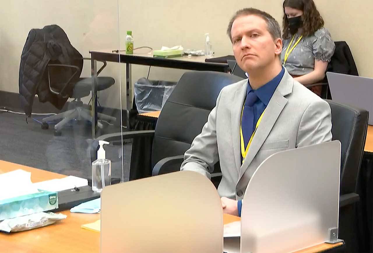 In this image from video, former Minneapolis police Officer Derek Chauvin listens while his defense attorney Eric Nelson gives closing arguments as Hennepin County Judge Peter Cahill presides Monday, April 19, 2021, in the trial of Chauvin at the Hennepin County Courthouse in Minneapolis. Chauvin is charged in the May 25, 2020, death of George Floyd. (Court TV via The Associated Press)