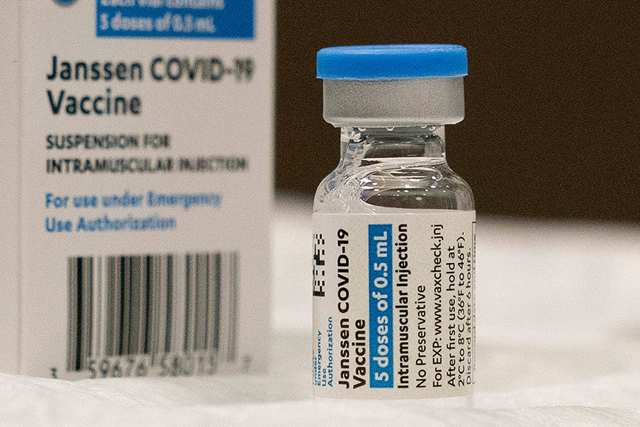 FILE - In this March 3, 2021, file photo, a vial of the Johnson & Johnson COVID-19 vaccine is displayed at South Shore University Hospital in Bay Shore, N.Y. With the U.S. pause of the vaccine, authorities are weighing whether to resume the shots the way European regulators decided to -- with warnings of a “very rare” risk. New guidance is expected late Friday, April 23, after a government advisory panel deliberates a link between the shot and a handful of vaccine recipients who developed highly unusual blood clots. (AP Photo/Mark Lennihan, File)