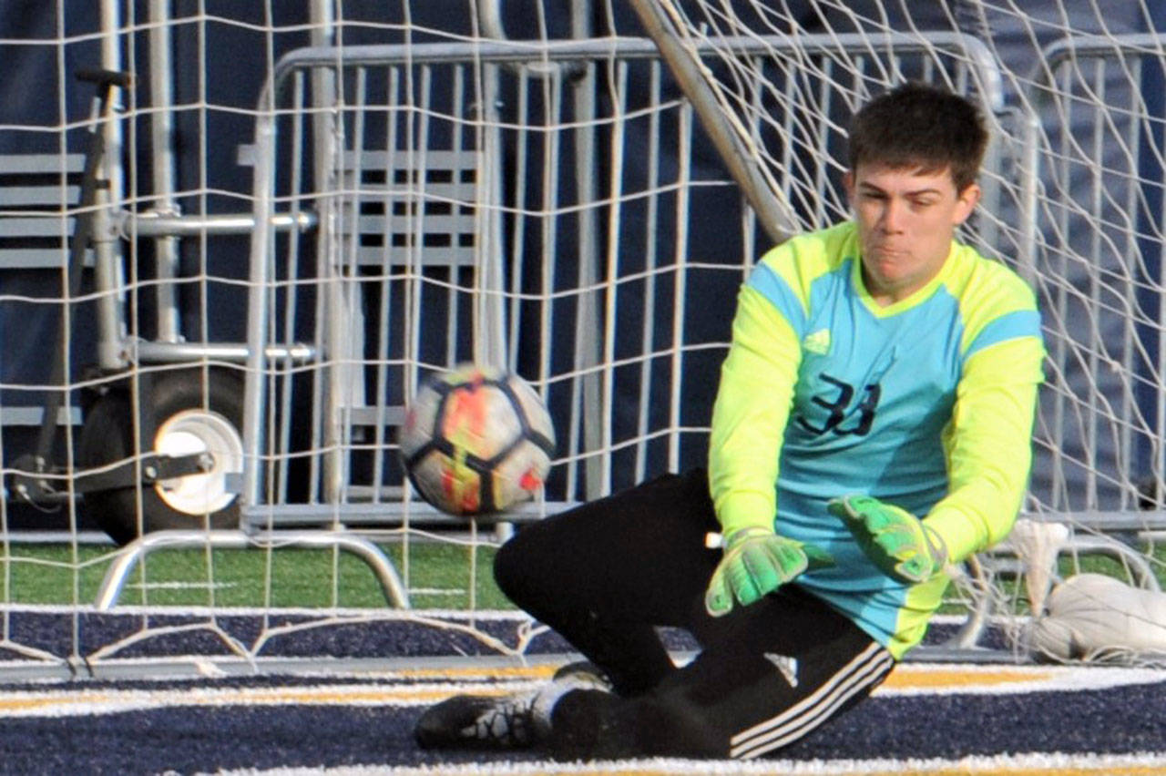 Lonnie Archibald/for Peninsula Daily News Forks goalkeeper Rafael Terrones saved a La Center penalty kick in the closing minutes to preserve the Spartans’ 3-2 win over the Wildcats in the district semifinals.