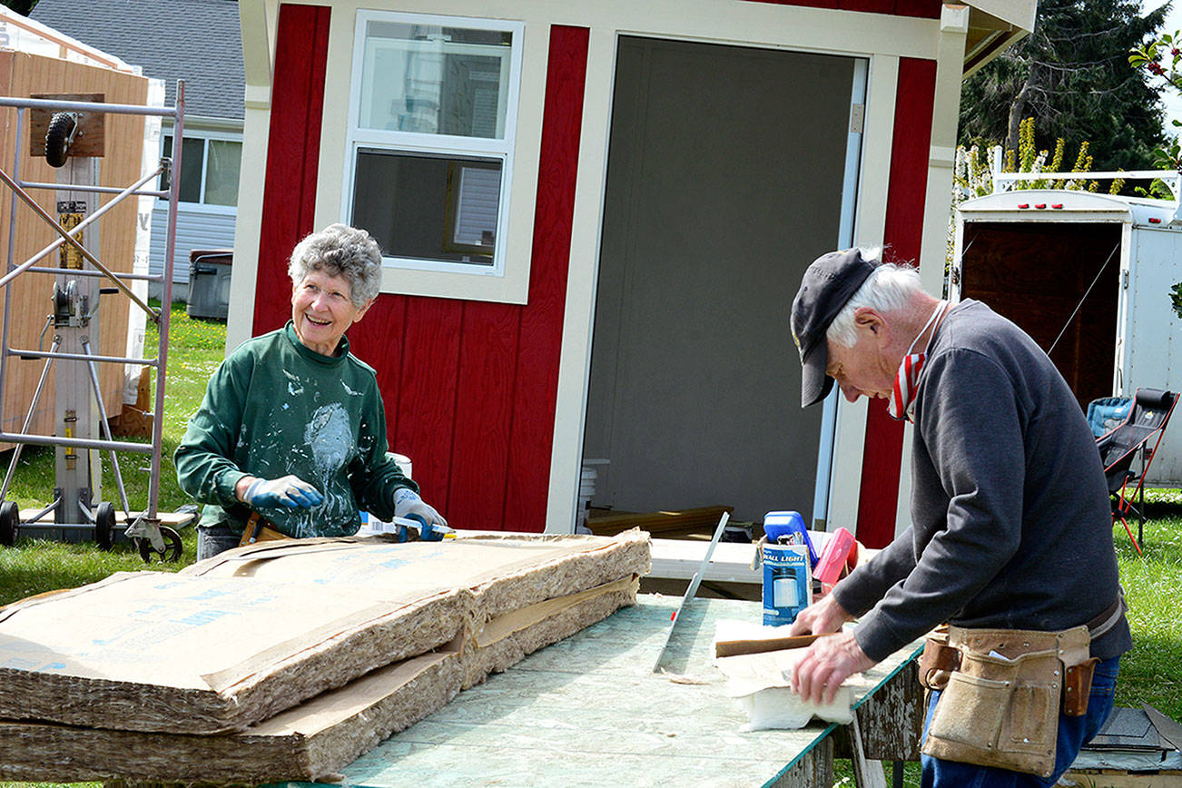 Diane and David Bommer are among the volunteers working on Bayside Housing's new transitional housing units. Their construction site is provided by Evangelical Methodist Church in Port Townsend. Diane Urbani de la Paz/Peninsula Daily News