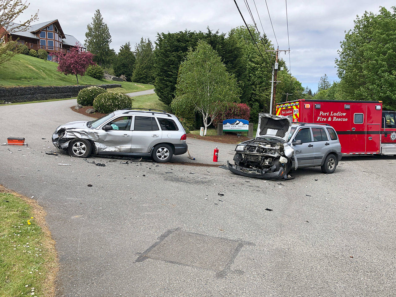 Two vehicles were destroyed in a collision on Oak Bay Road on Tuesday that sent two people to a hospital.(Photo courtesy of Jefferson County Sheriff’s Office)