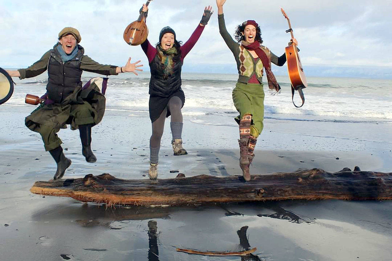 The band Three Wheels Turning — from left, Aimée Ringle, Micaela Kingslight and Samara Jade — will bring harmonies, strings and percussion to the Keg & I in Chimacum on Saturday. (photo by Terry Du Beau)