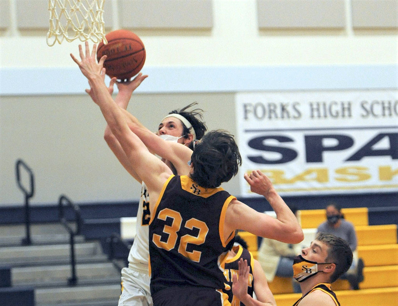 PREP BASKETBALL Team effort as Forks takes down South Bend Peninsula