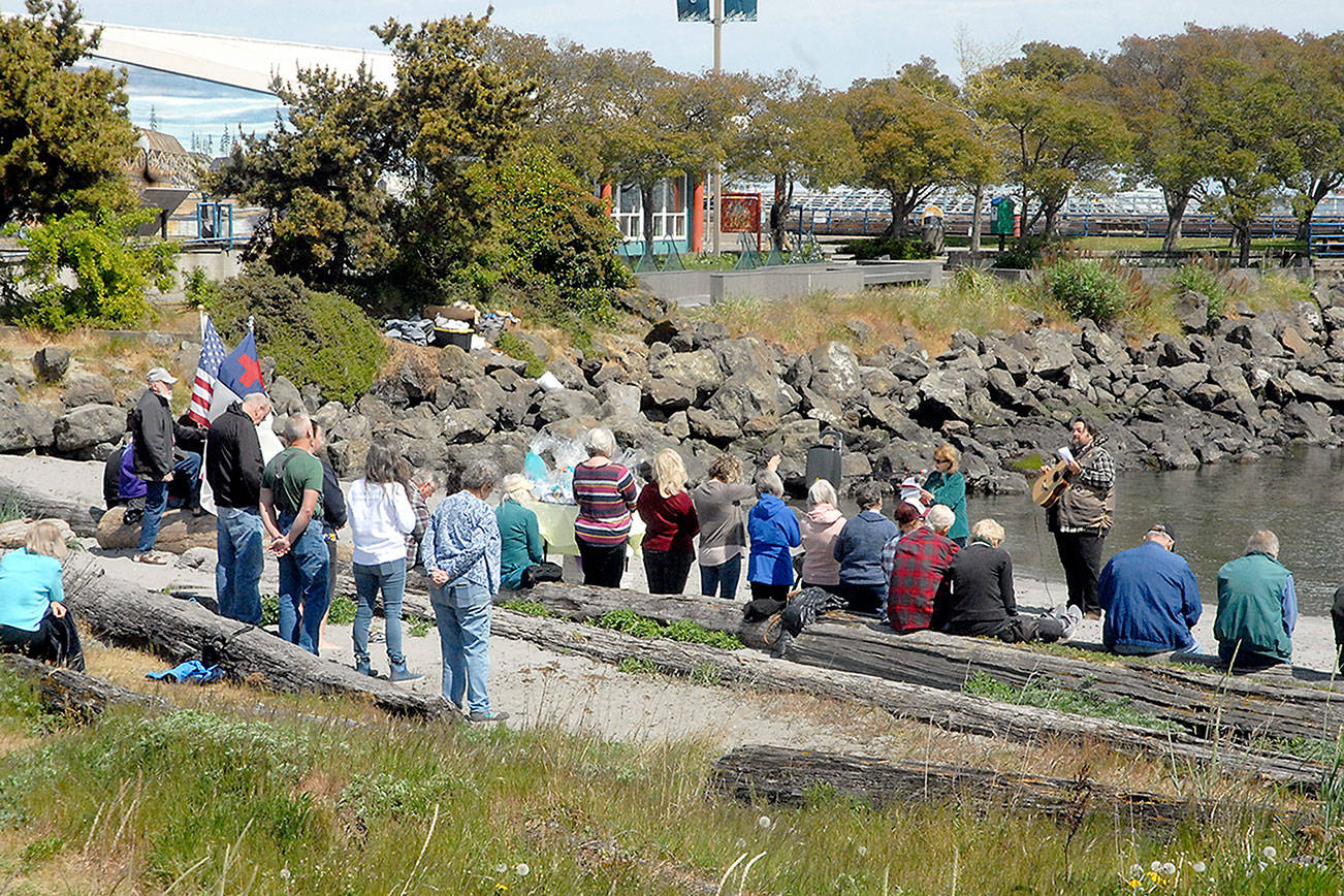 Keith Thorpe/Peninsula Daily News
People gather on Hollywood Beach in Port Angeles for Thursdays Natiional Day of Prayer -- a nationwide event where people are asked "to turn to God in prayer and meditation." The observance is held on the first Thursday of May, designated by the United States Congress. About 50 people took part in the Port Angeles event, serving both Clallam and Jefferson counties.