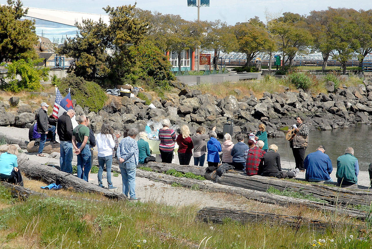 People gather on Hollywood Beach in Port Angeles for Thursdays Natiional Day of Prayer — a nationwide event where people are asked “to turn to God in prayer and meditation.” (Keith Thorpe/Peninsula Daily News)