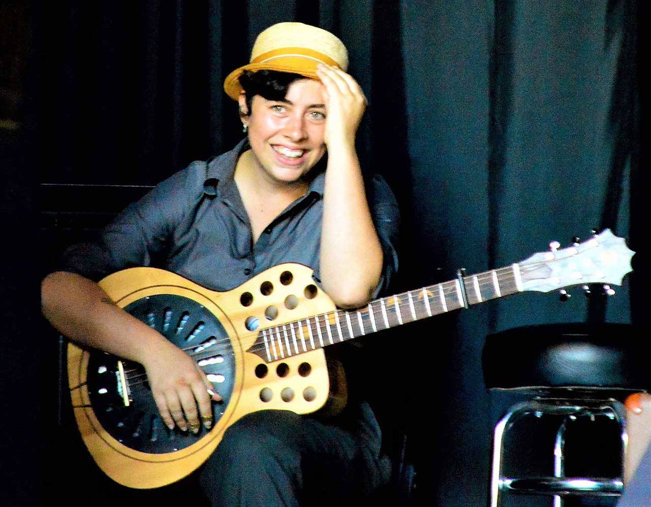 Red Hot Strings teaching artist Albanie Falletta, seen during a performance at Fort Worden State Park in summer 2019, is among the Red Hot Strings workshop faculty members streaming her sessions online later this week. (Diane Urbani de la Paz/Peninsula Daily News)