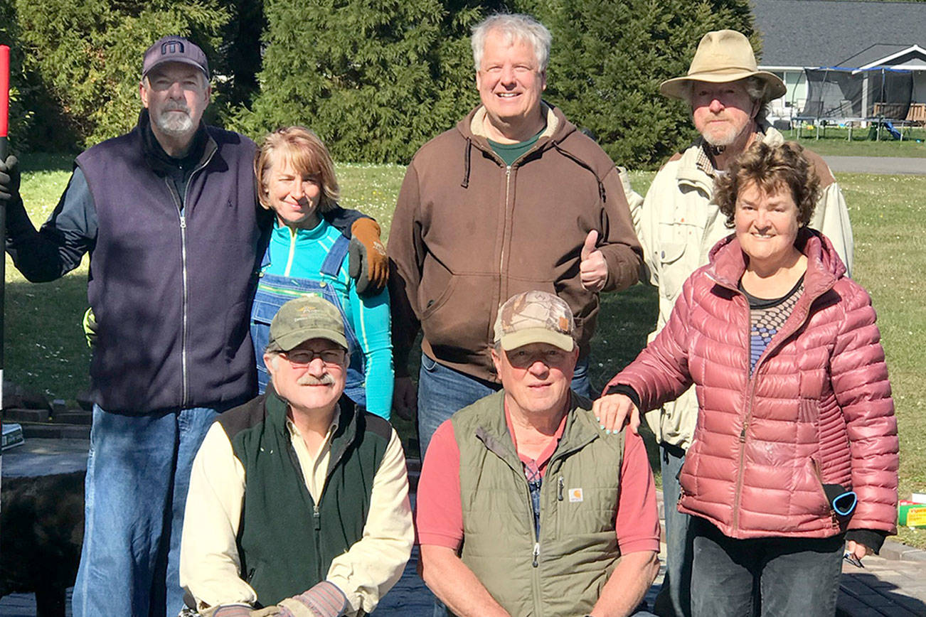 Olympic Universalist Unitarian Fellowship friendship garden construction team; back row, from left to right: Kevin Duffy and Nancy Duffy, Phil Zenner and Tom Massey; front row, from left to right: Brian Berardo, Lou Foldoe and Rose Prestipino.