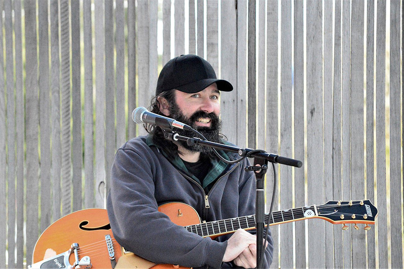 Singer-songwriter Jack Dwyer, pictured at the Keg & I in Chimacum, will give a free outdoor performance in Uptown Port Townsend this Saturday at 2 p.m. Diane Urbani de la Paz/Peninsula Daily News