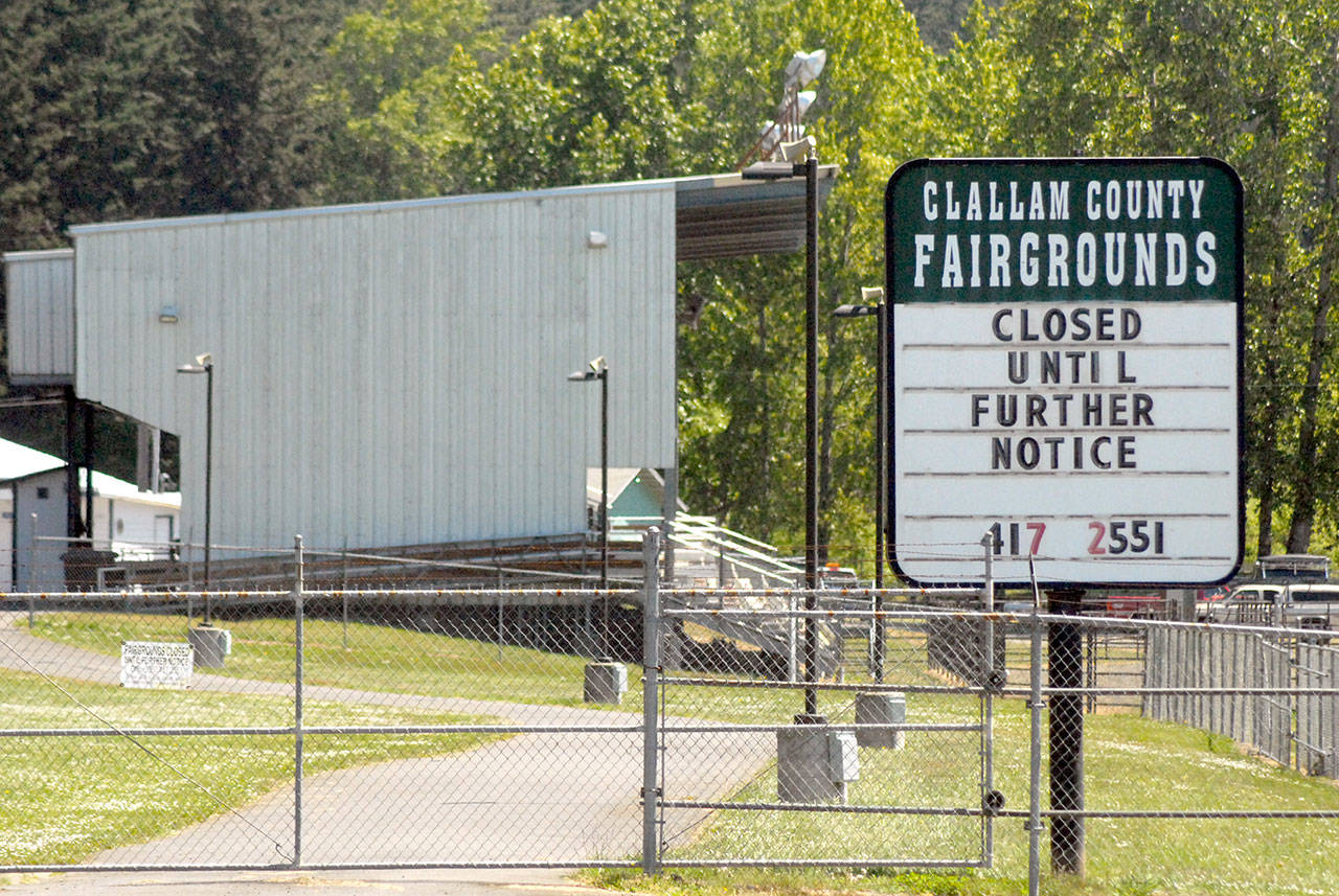 A sign at the west entrance informs of the indefinite clousre of the Clallam County Fairgrounds in Port Angeles. Clallam County Fair officials havt cancelled the annual fair for a second year. (Keith Thorpe/Peninsula Daily News)