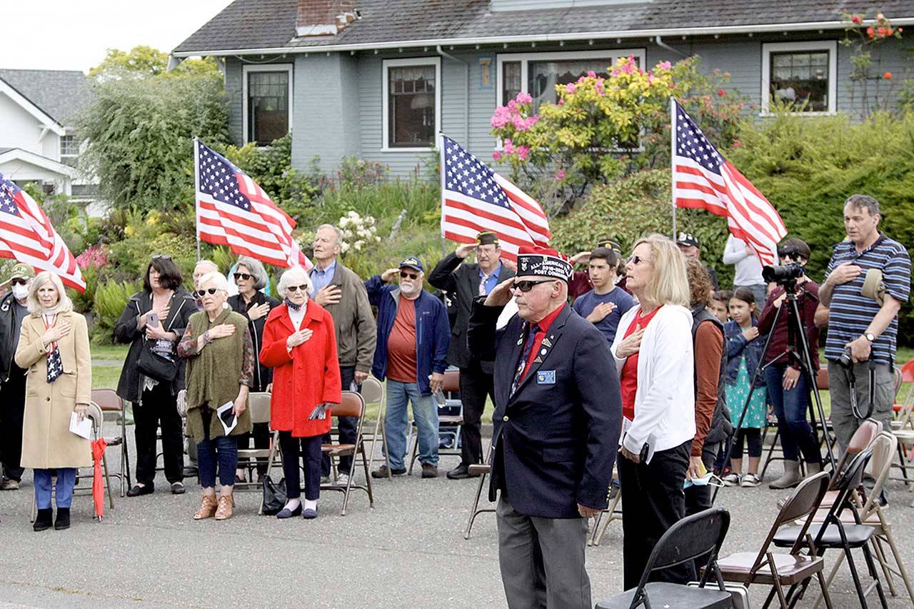 About 70 people assembled for a memorial service in front of the Captain Joseph House in Port Angeles. Sunday marked the 10-year anniversary of the deaths of three servicemen in Afghanistan, including Staff Sgt. Martin R. Apolinar, Sgt. Aaron J. Blasjo and Capt. Joseph W. Schultz. (Dave Logan/for Peninsula Daily News)