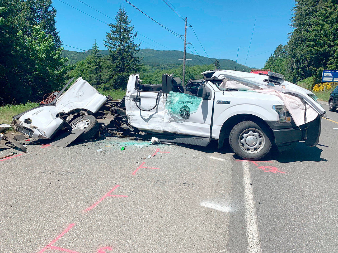 A Washington State Patrol officer was seriously injured Tuesday morning when the driver of a stolen pickup struck his vehicle on U.S. Highway 101 at Discovery Bay. (Photo courtesy of the Washington State Patrol)