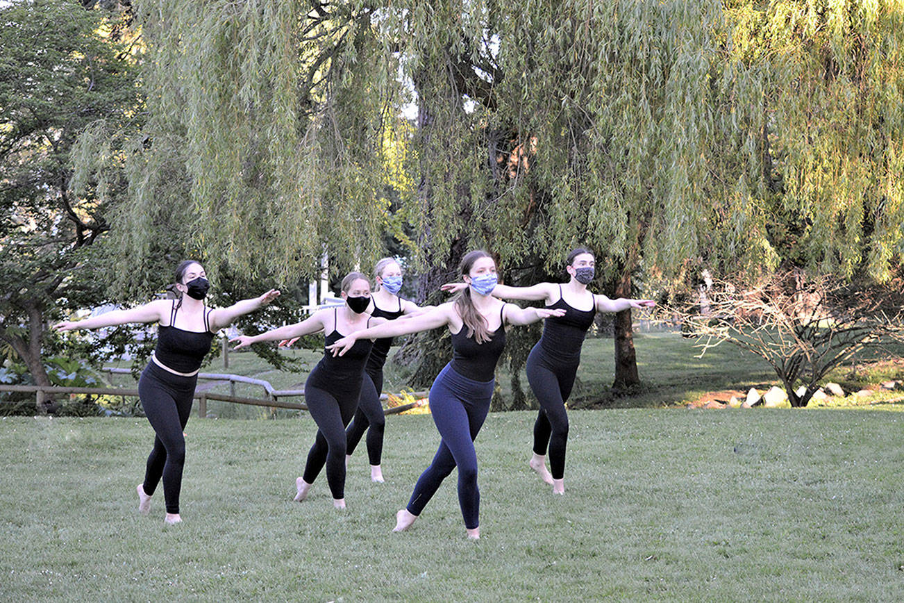 Ling Hui’s Dance students, from left, Jeannette Patric, Maeve Kenney, Anabel Moore, Maggie Emery and Matia Reimnitz, mark the end of the school year with a performance Friday in Port Townsend’s Chetzemoka Park. (Diane Urbani de la Paz/Peninsula Daily News)