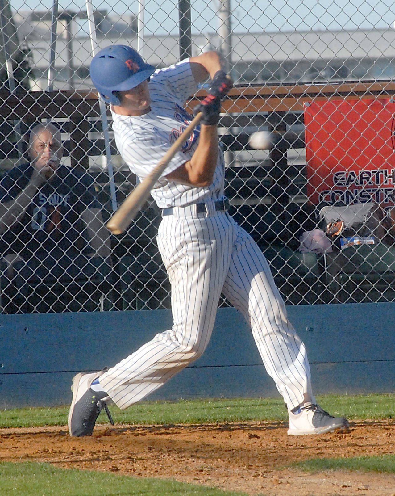 The Lefties’ Coleman Schmidt bats in the third inning on Tuesday evening for the team’s season opener against the Highland Bears at Port Angeles Civic Field. (Keith Thorpe/Peninsula Daily News)