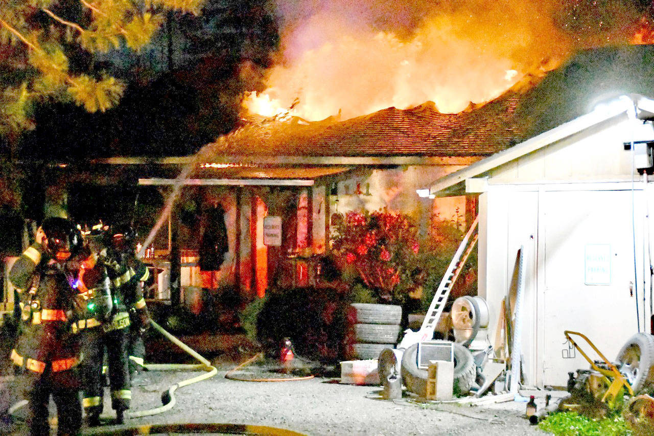 A late Monday evening blaze that firefighters said appeared to begin on the exterior of the building destroyed a home on West U.S. Highway 101 when the residents were not home. (Clallam County Fire District 2)