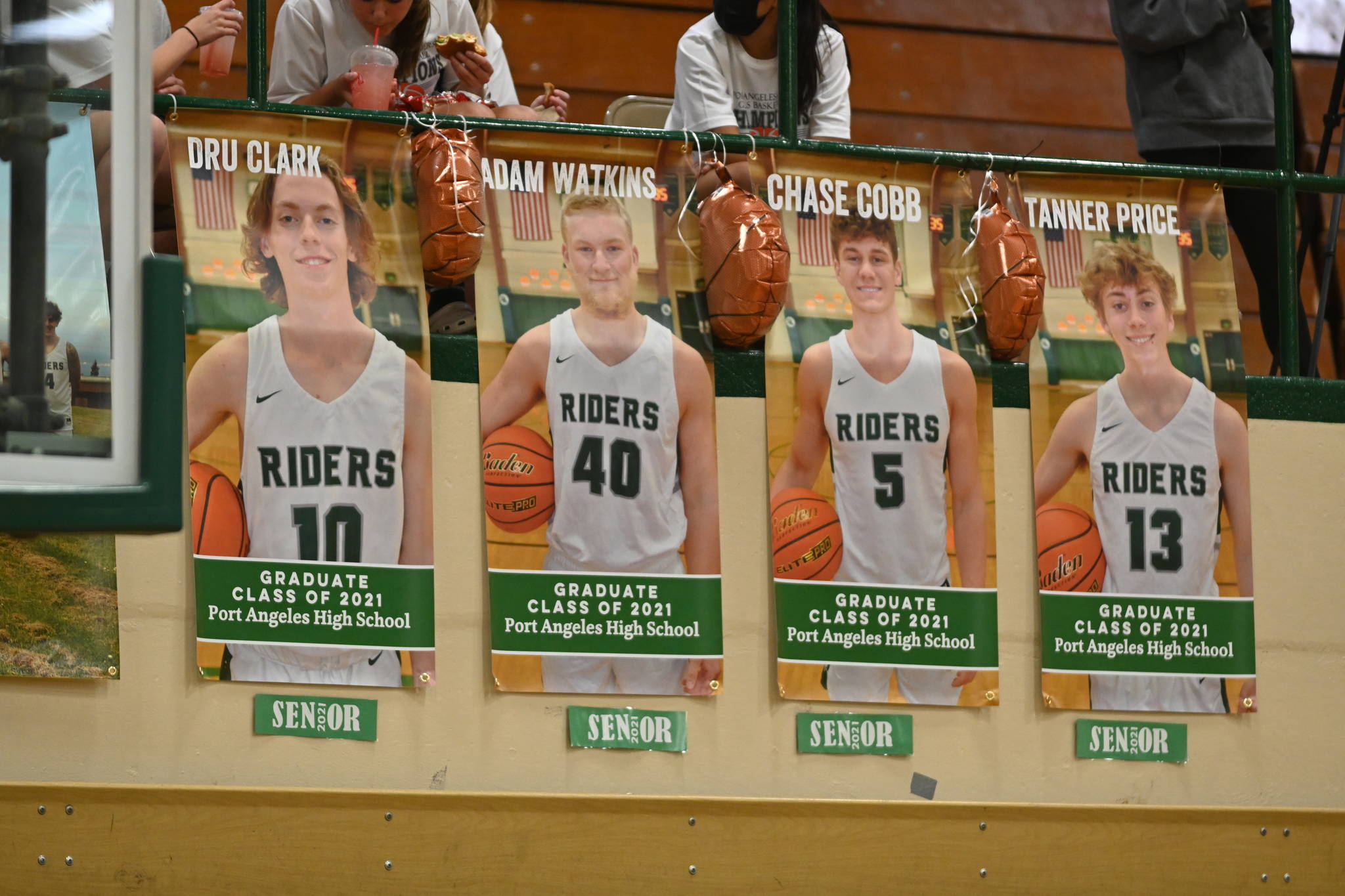 Posters of Port Angeles seniors Dru Clark, Adam Watkins, Chase Cobb and Tanner Price adorned the walls of the Rider Gym this season.
Michael Dashiell/Olympic Peninsula News Group