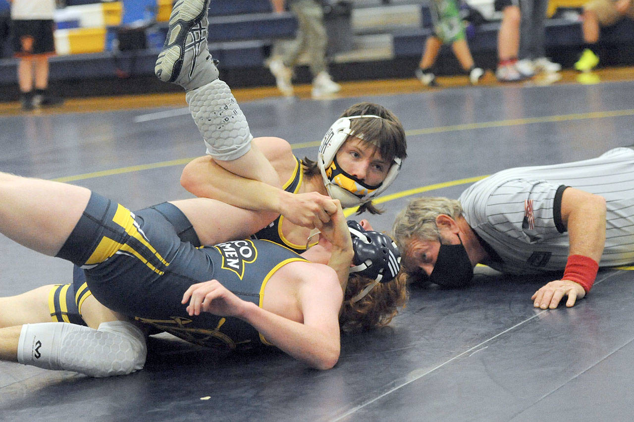 Forks’ Dalton Kilmer pinned his Ilwaco opponent during the Class 2B Southwest District Tournament at Forks on Wednesday. (Lonnie Archibald/for Peninsula Daily News)
