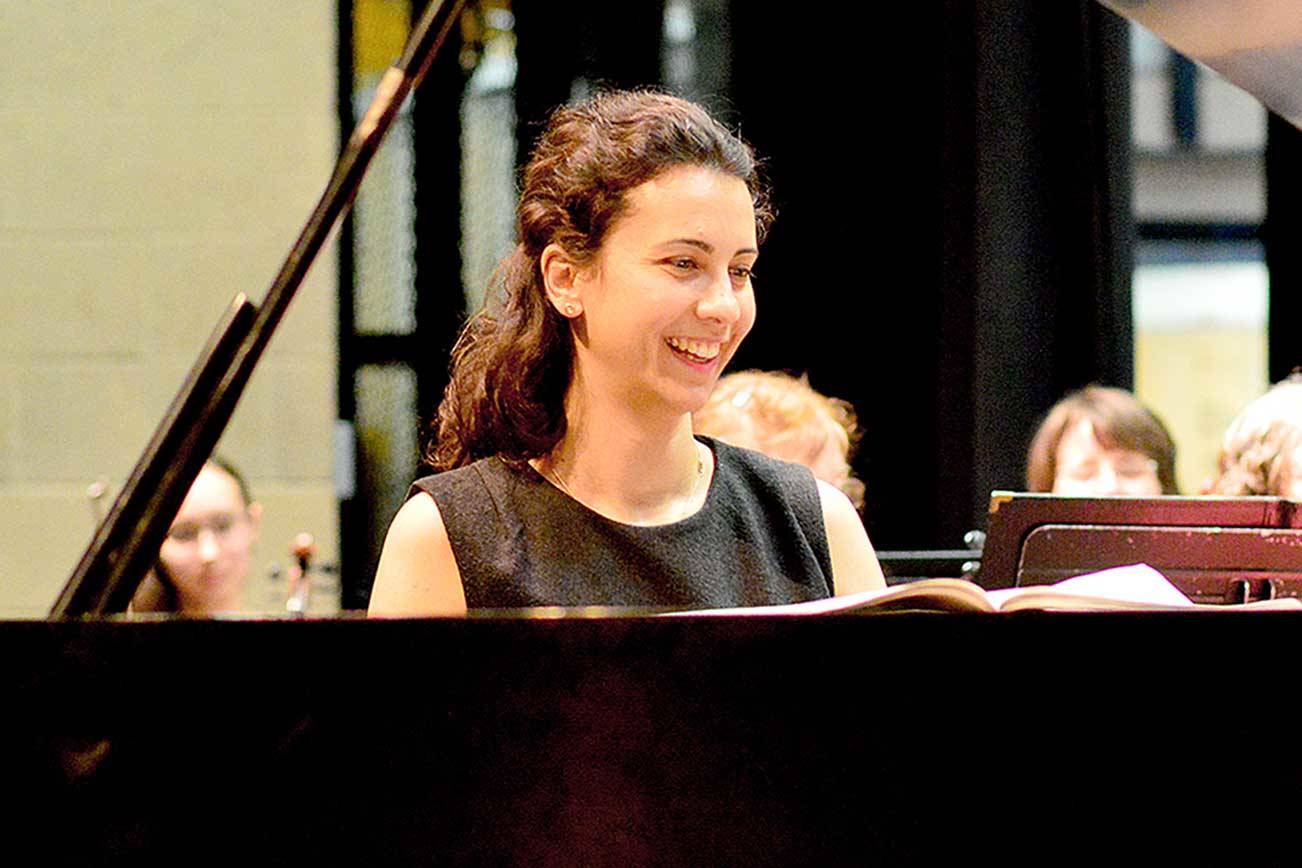 Bulgarian pianist Anna Petrova, pictured during her first rehearsal with the Port Angeles Symphony in 2017, will return for the first full concert of the orchestra’s 2021-2022 season. (Diane Urbani de la Paz/Peninsula Daily News)