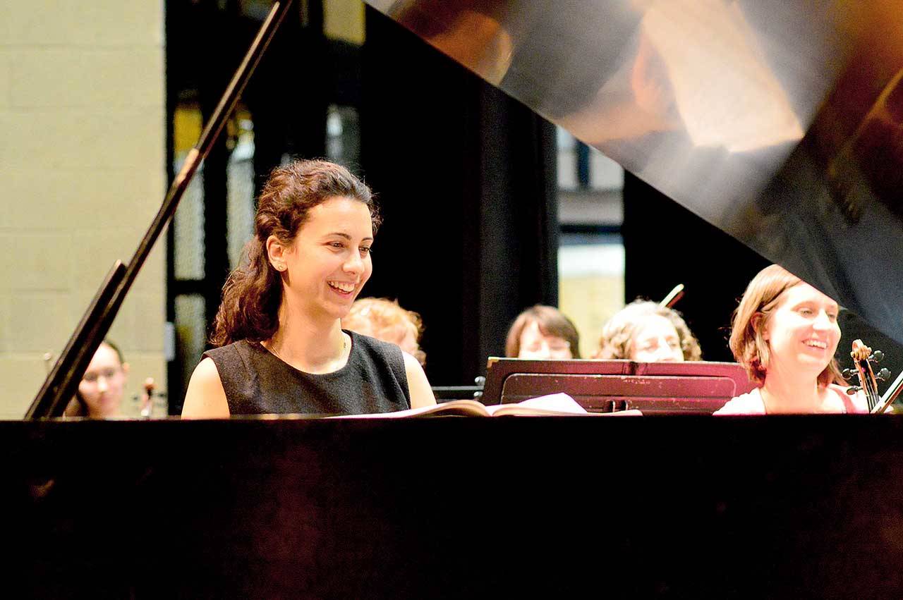 Bulgarian pianist Anna Petrova, pictured during her first rehearsal with the Port Angeles Symphony in 2017, will return for the first full concert of the orchestras 2021-2022 season. (Diane Urbani de la Paz/Peninsula Daily News)