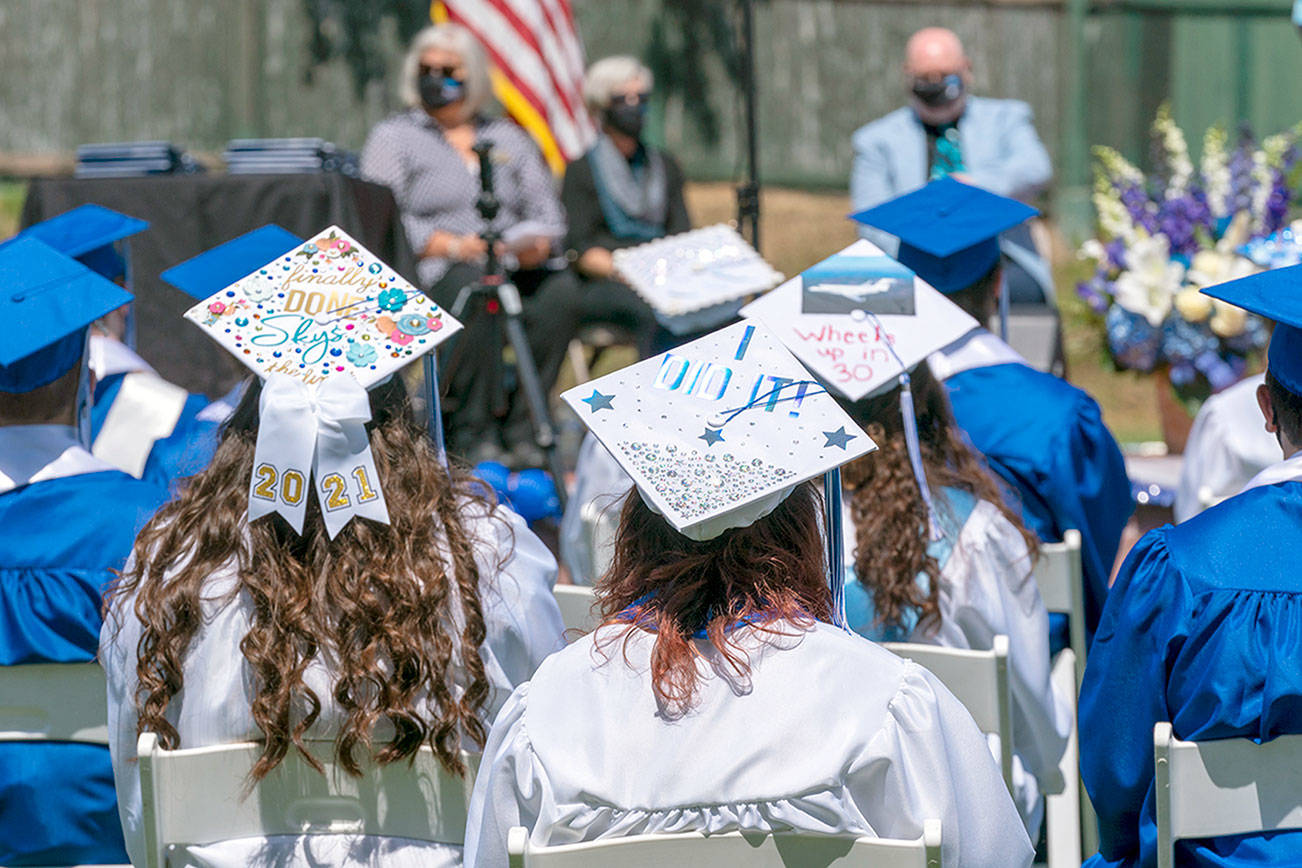 Steve Mullensky/for Peninsula Daily News

Mortar board art display on Chimacum graduating seniors during a ceremony at Memorial Field on Saturday in Port Townsend.