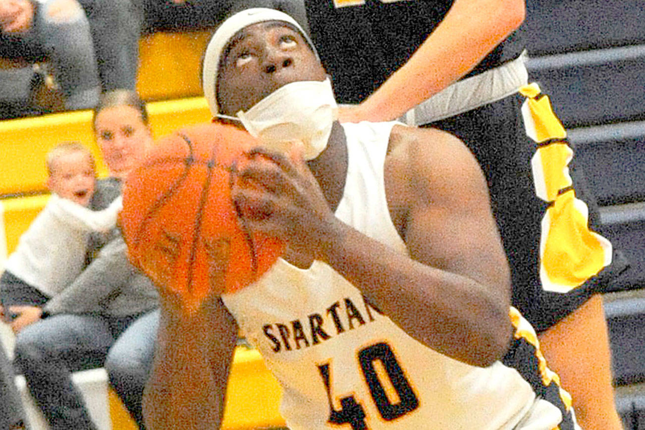 Lonnie Archibald/for Peninsula Daily News
Forks' Trey Baysinger (40) was named the Most Valuable Player of the boys basketball 2B Pacific League last week.