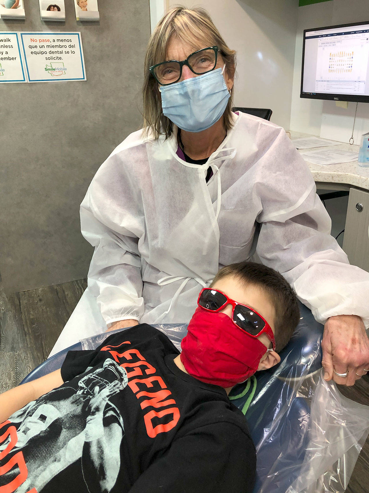Dr. Ann Sabatino comes this week to Chimacum on the Smilemobile, which provides dental care to babies, children and adults who are uninsured or covered by Medicaid. To make an appointment, phone 888-286-9105. (Photo courtesy of the Smilemobile)