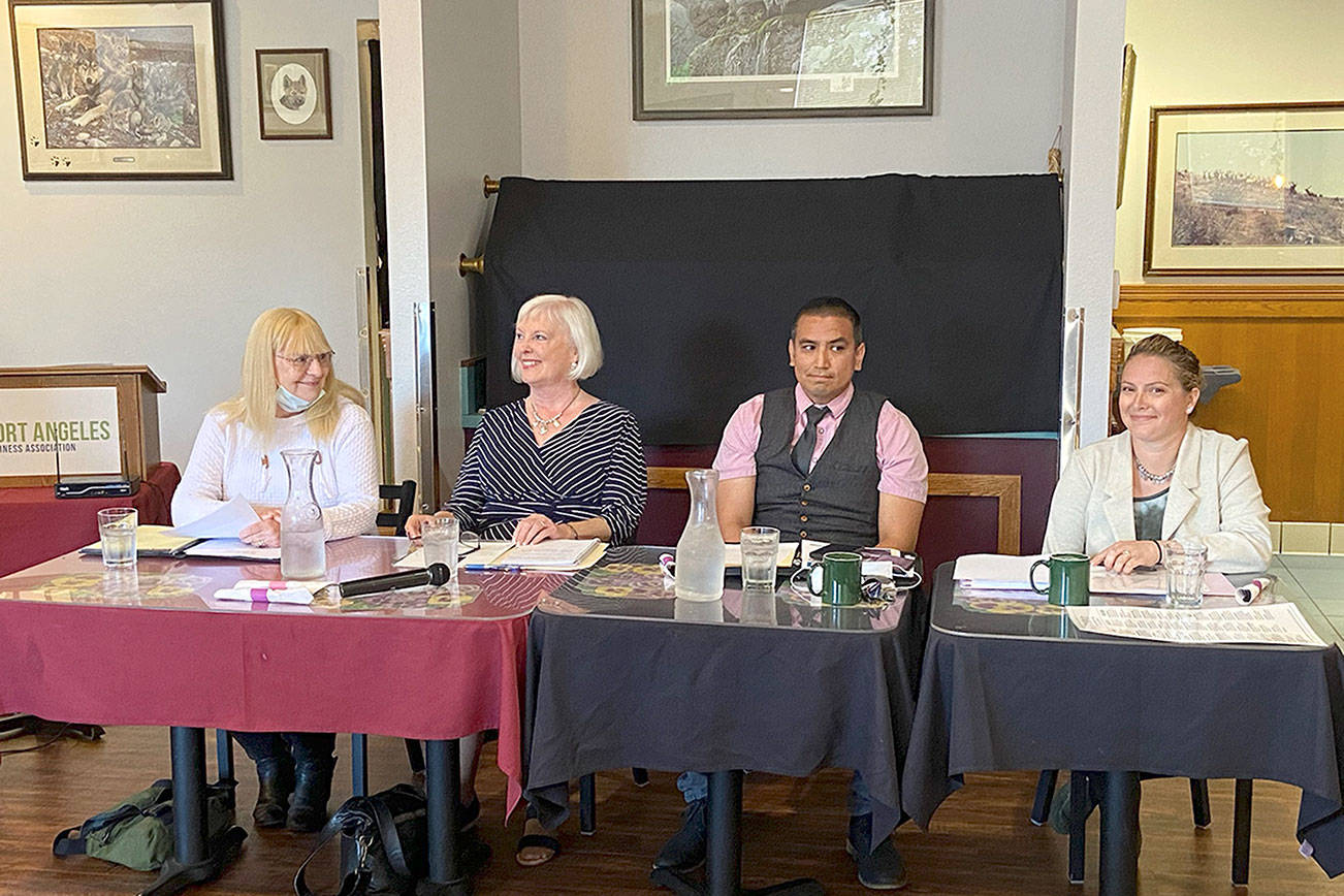 Port Angeles School Board candidates, from left, Jean Stratton, Mary Hebert, Jesse Charles and Gabi Johnson prepare to debate at a Port Angeles Business Association breakfast meeting at Joshua’s Restaurant. (Rob Ollikainen/Peninsula Daily News)