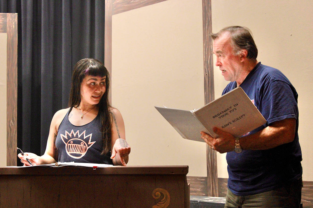 Olympic Theatre Arts newcomer Ashley Burton rehearses with veteran actor and director Ron Graham for the late Jim Guthrie’s “Searching for a Heart.”