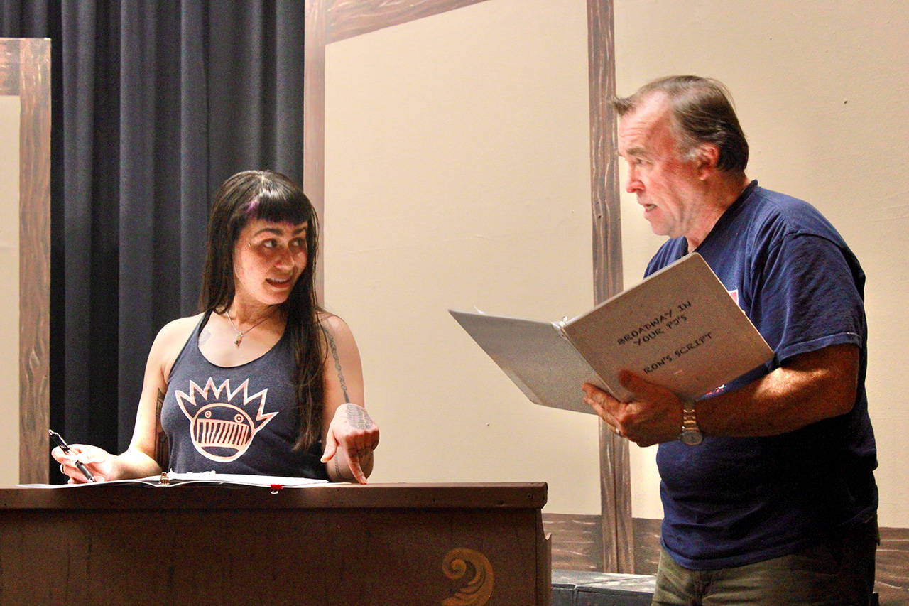 Olympic Theatre Arts newcomer Ashley Burton rehearses with veteran actor and director Ron Graham for the late Jim Guthries Searching for a Heart.