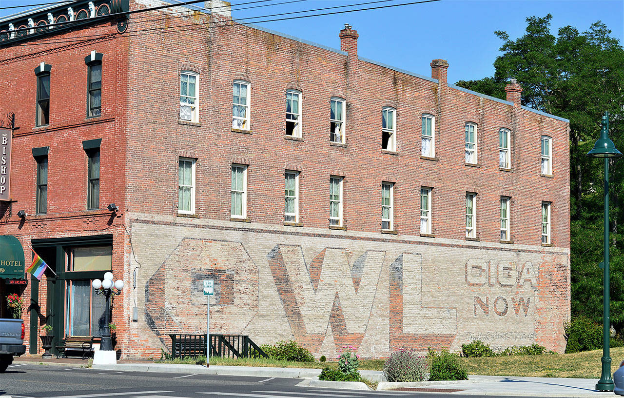 The Owl Cigars mural is one of many stops on the Jefferson County Historical Society’s “Vanishing Murals” walking tours starting in July. Owl’s message was among the company’s numerous advertisements on walls across the country. (Diane Urbani de la Paz/Peninsula Daily News)