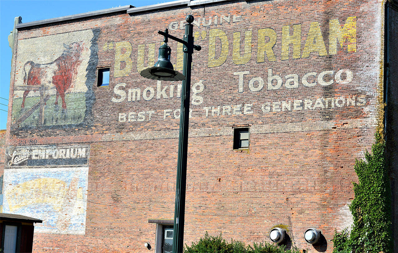An advertisement for a popular tobacco on the Fred Lewis building in downtown Port Townsend is among many stops on the Vanishing Murals walking tours to start in July. (Diane Urbani de la Paz/Peninsula Daily News)