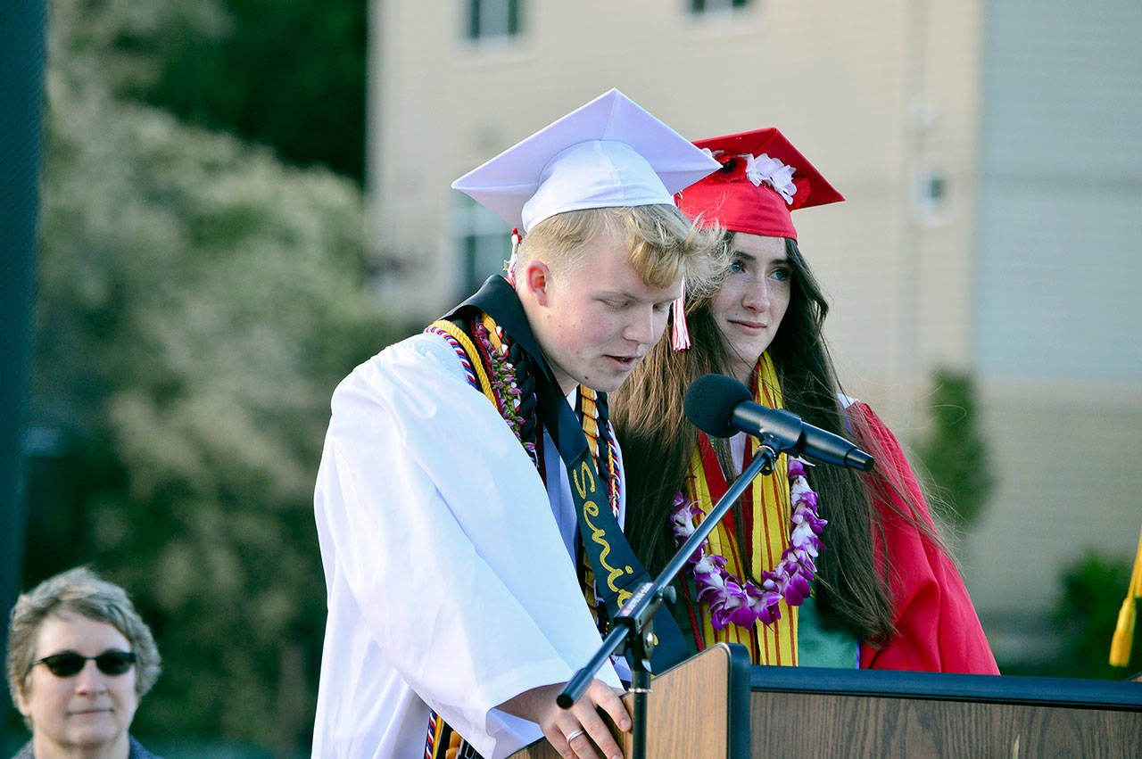 Finn O’Donnell and Sorina Johnston, pictured as they graduate from Port Townsend High School last month, speak their minds about mental health during the pandemic in a video on The Benji Project website. (Diane Urbani de la Paz/Peninsula Daily News)