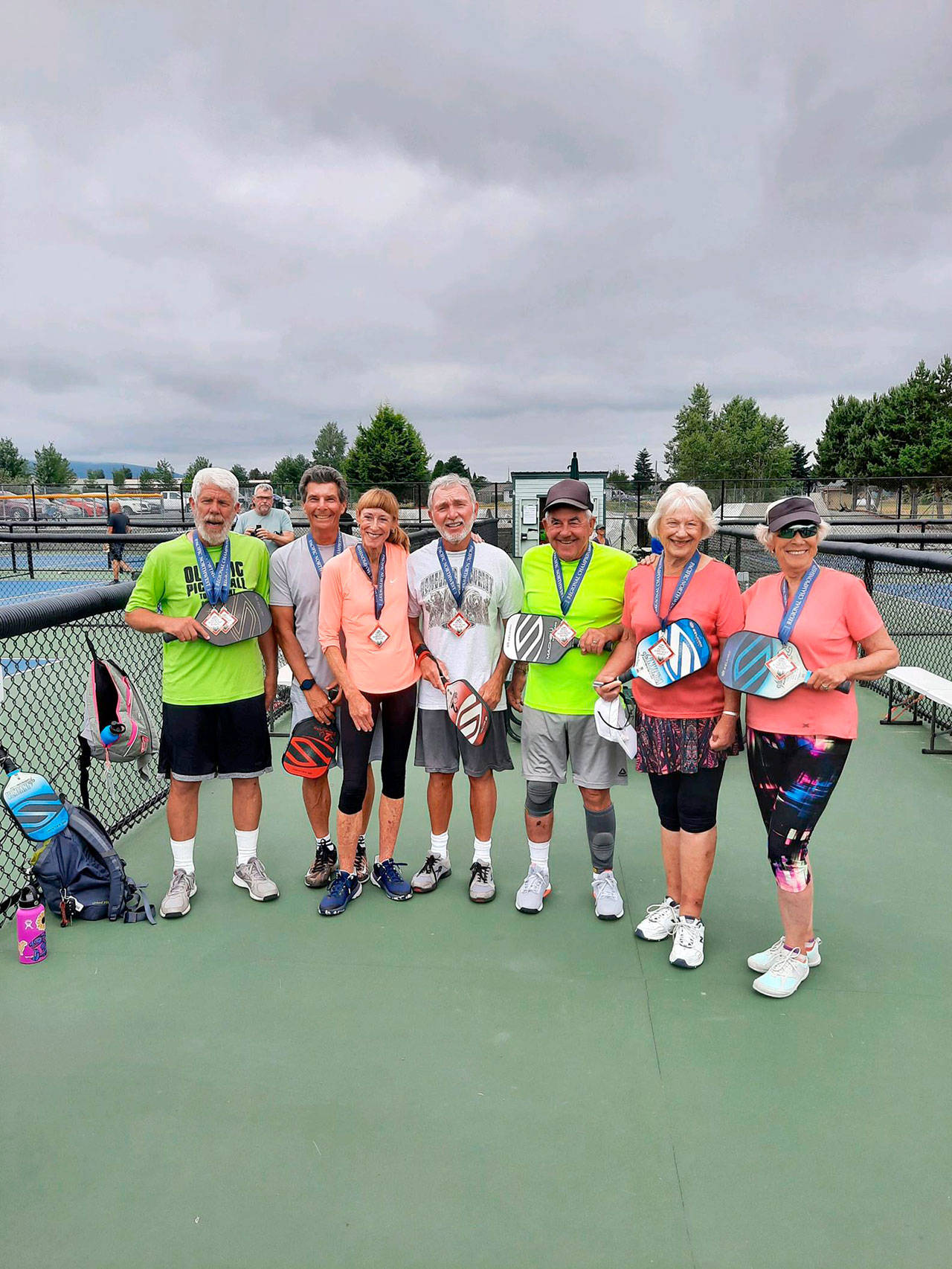 Sequim Picklers members, from left, Steve Bennett, Richard Reed, Colleen Alger, John Herbolt, Bob Sester, Jeannie Ramsey and Beverly Hoffman were part of 14-strong Sequim Picklers contingent that competed at the 2021 USA Pickleball Pacific Northwest Regional Championship in Boise, Idaho, last month.
Sequim Picklers members from left, Steve Bennett, Richard Reed, Colleen Alger, John Herbolt, Bob Sester, Jeannie Ramsey and Beverly Hoffman were part of 14-strong Sequim Picklers contingent that competed at the 2021 USA Pickleball Pacific Northwest Regional Championship in Boise, Idaho, last month.