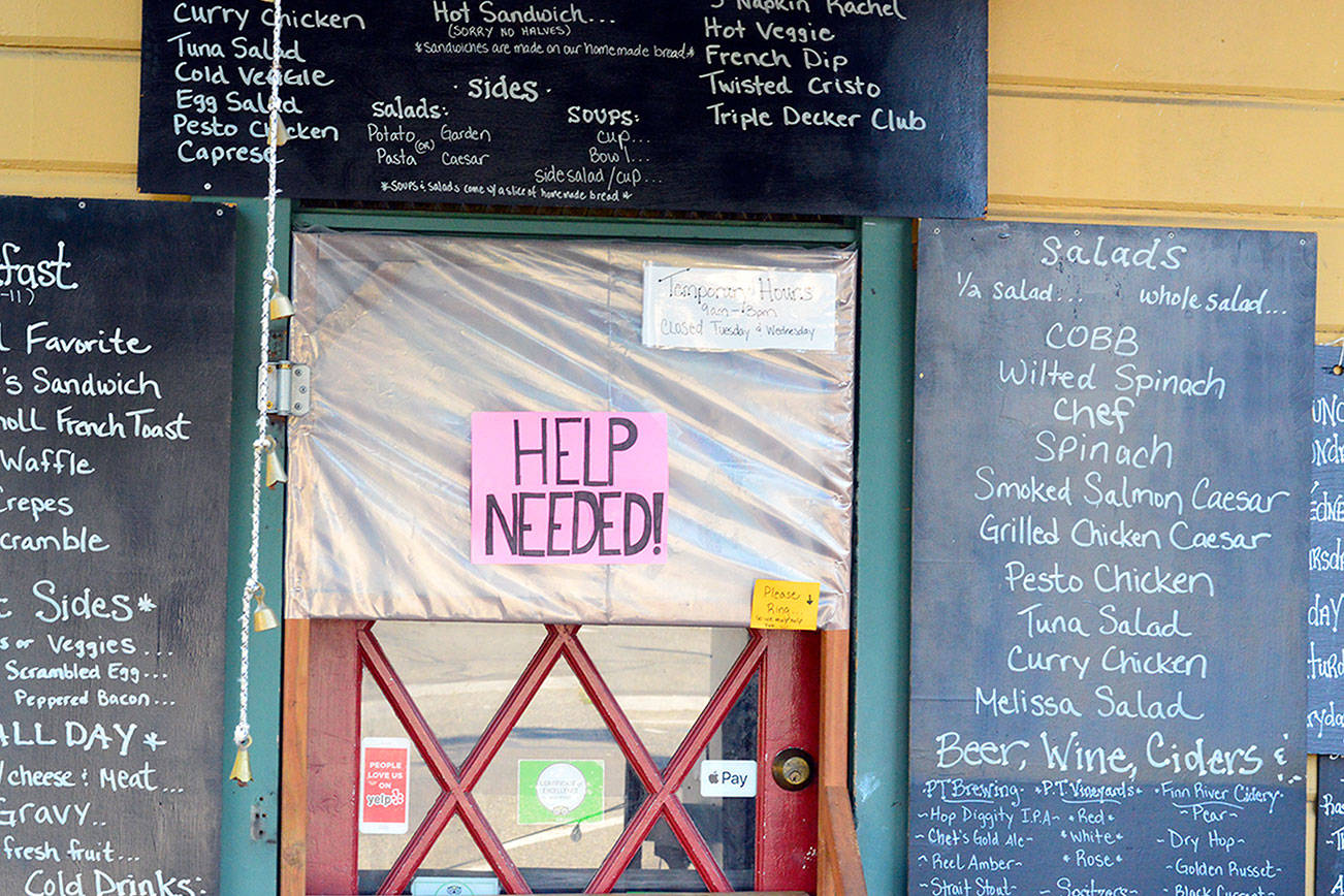 The sign at the Courtyard Cafe in downtown Port Townsend tells the tale of restaurants in summer 2021. Diane Urbani de la Paz/Peninsula Daily News