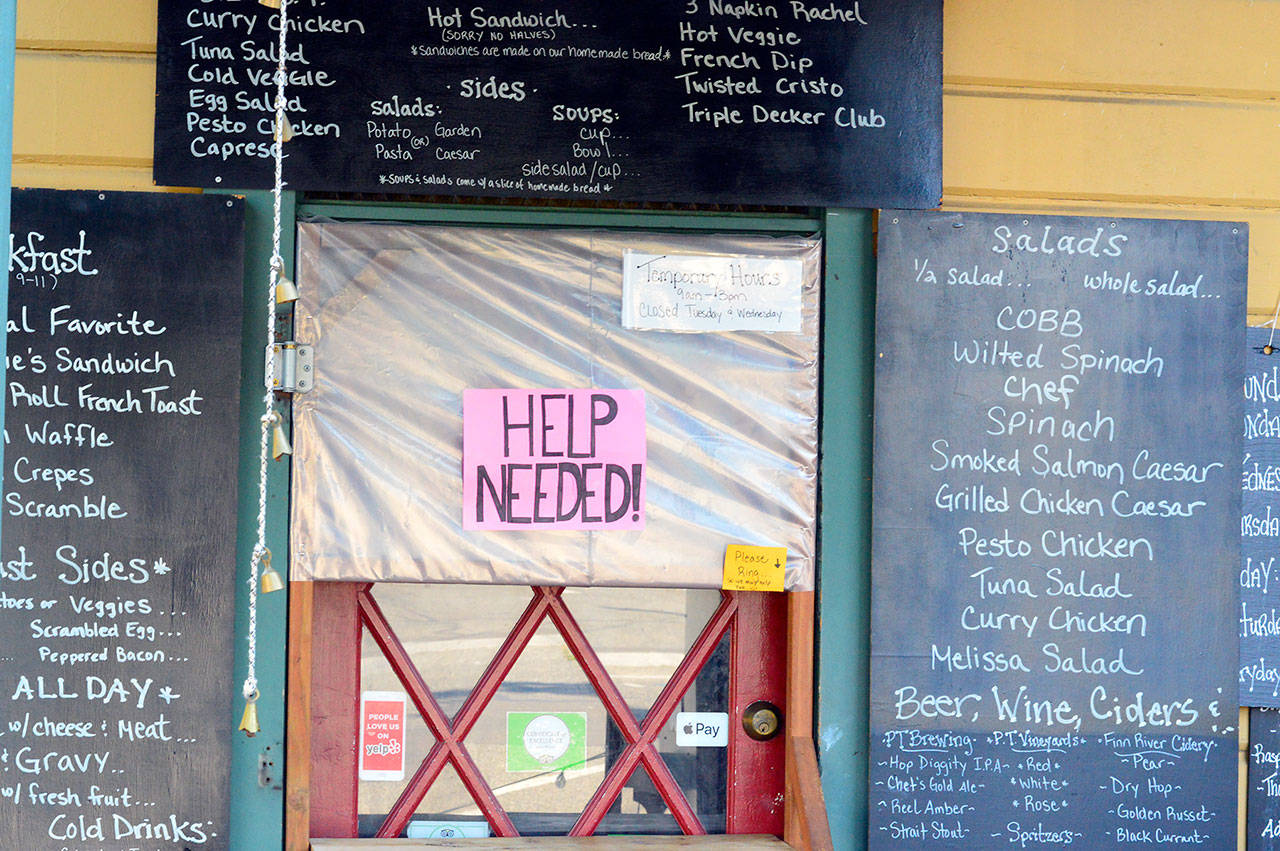The sign at the Courtyard Cafe in downtown Port Townsend tells the tale of restaurants in summer 2021. (Diane Urbani de la Paz/Peninsula Daily News)