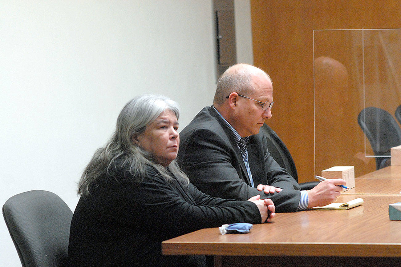 Keith Thorpe/Peninsula Daily News
Larisa Jean Dietz of Sequim sits with attorney Stan Myers on Friday at Clallam County Superior Court in Port Angeles.