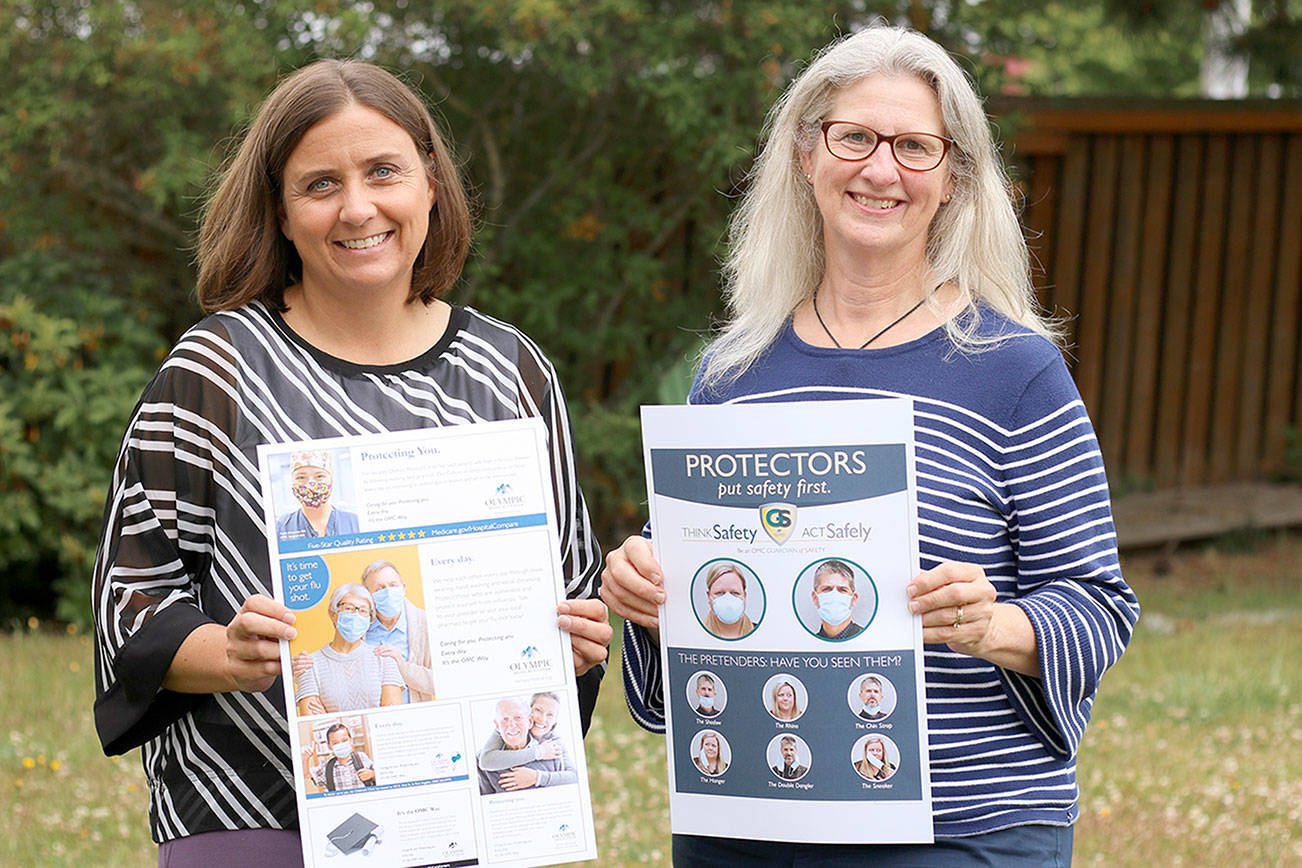 Olympic Medical Center's marketing and communications team, Director Bobby Beeman, left, and Senior Marketing Coordinator Donna Pacheco show the posters that won them two gold medals in the 2012 Aster Awards for excellence in advertising and marketing.

The team was honored for its advertising series “The OMC Way” and for its educational flyer “Protectors vs. Pretenders,” which showed patients and visitors the correct way to wear masks.