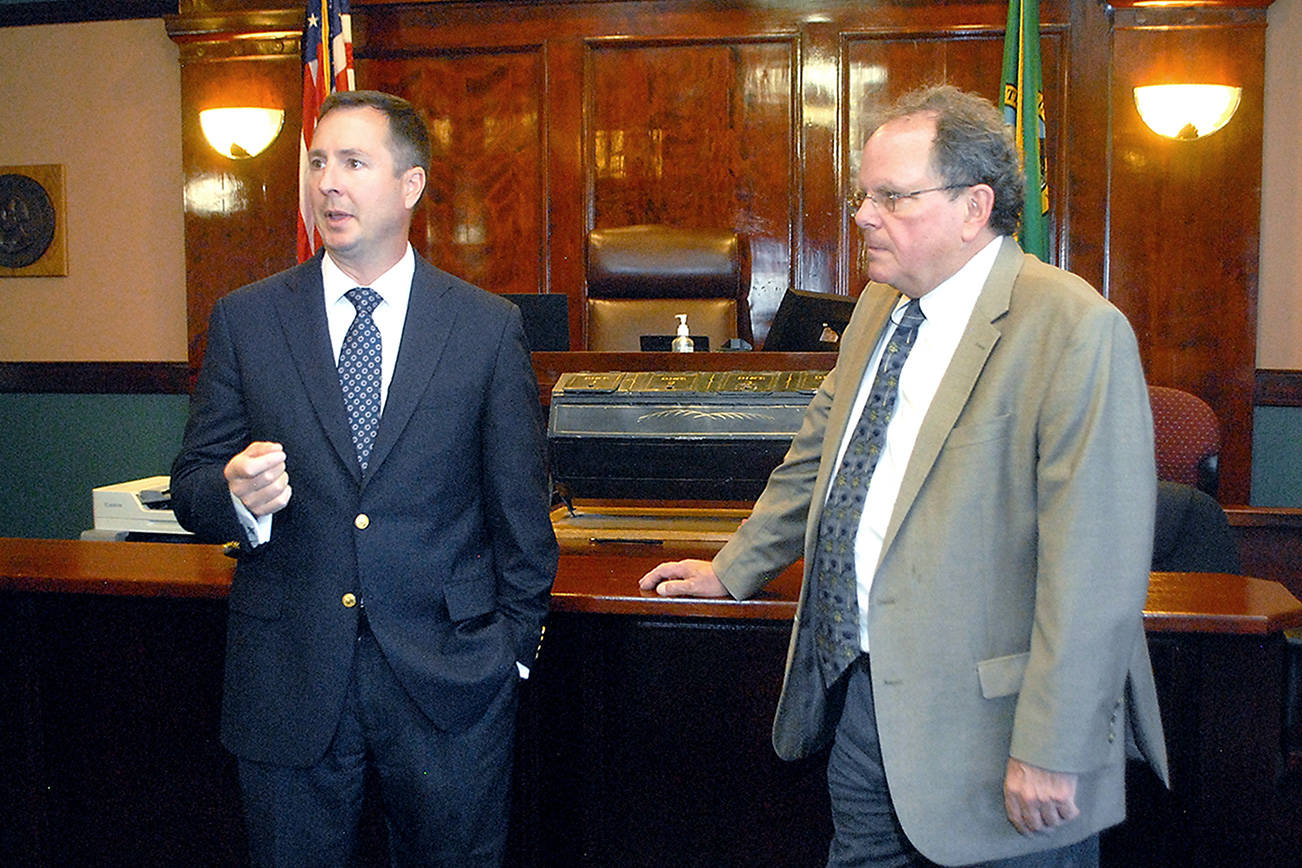 Clallam County Prosecuting Attorney Mark Nichols, left, talks about a proposed mental health court program accompanied by District Court Judge Dave Neupert on Tuesday at the Clallam County Courthouse in Port Angeles. (Keith Thorpe/Peninsula Daily News)