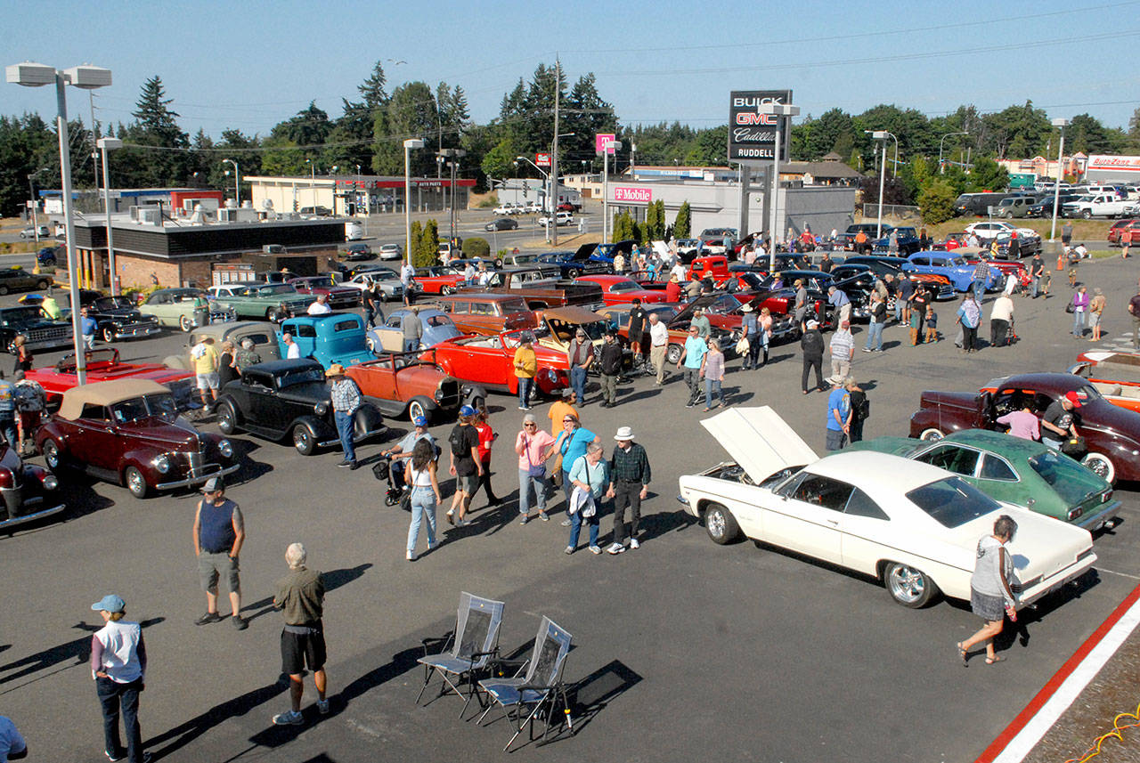 Vintage cars stand on display at Friday night’s Ruddell Cruise In at Ruddell Auto Plaza in Port Angeles. (Keith Thorpe/Peninsula Daily News)