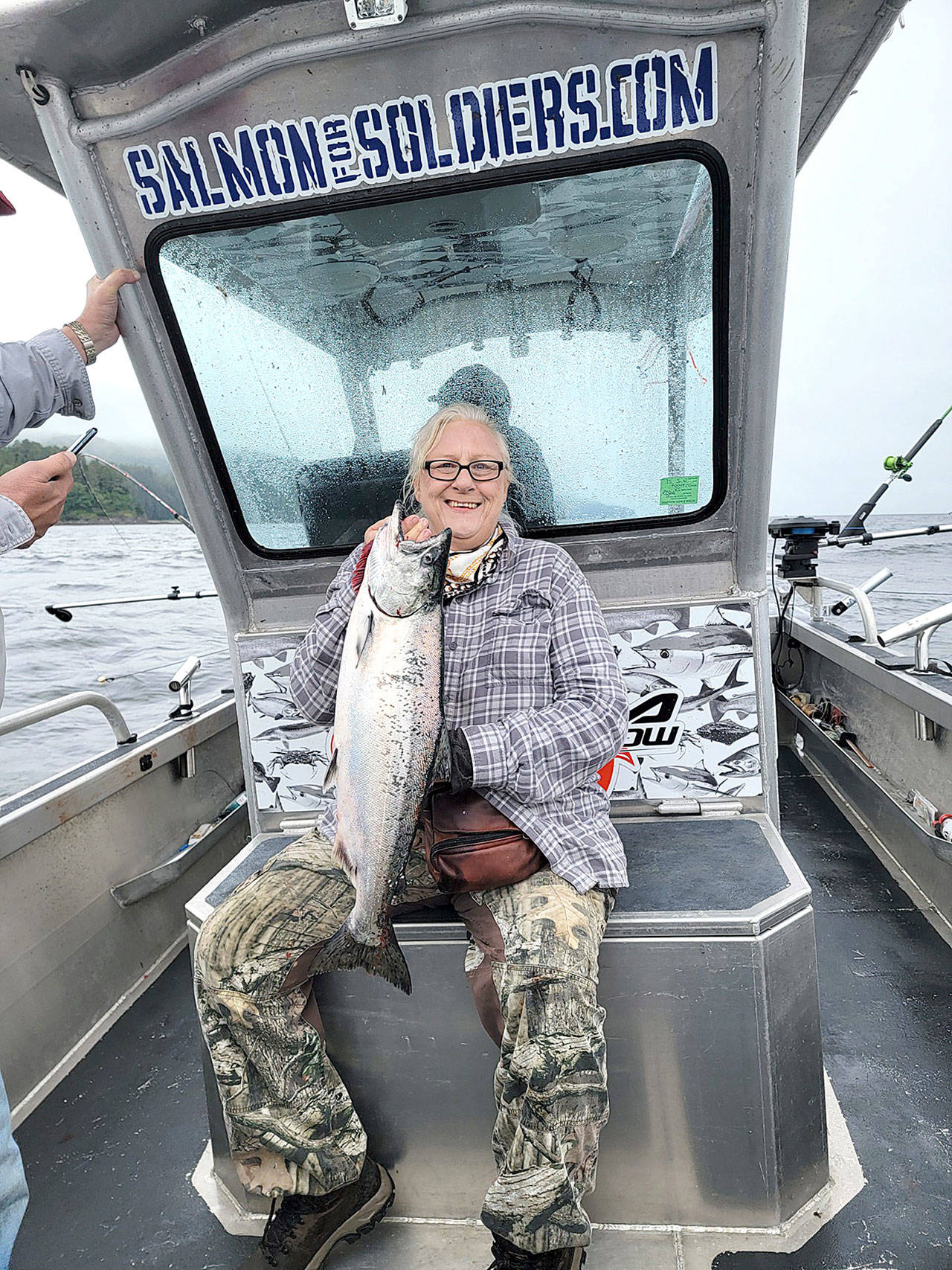 The Sequim Chapter of Salmon For Soldiers is planning a large salmon fishing trip for veterans and active-duty military off Sekiu on Aug. 15. Lori Hester, a former Army nurse, limited on salmon Saturday in an outing with the group.