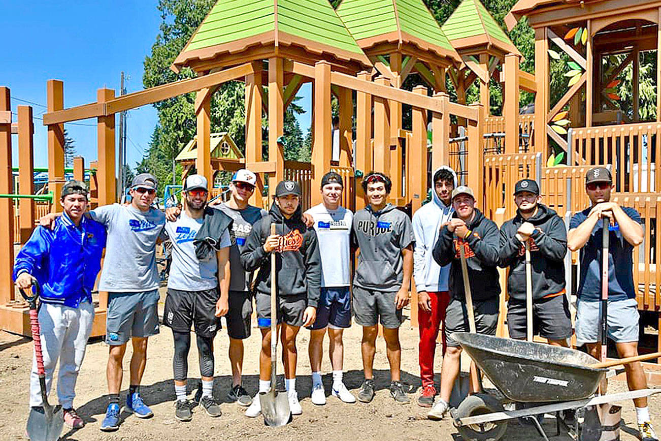 Chig Martin/Port Angeles Lefties
Members of the Port Angeles Lefties chipped in for four days last week to help build the new Generation II Dream Playground at Erickson Playfield across Race Street from Civic Field. Coach/owner Matt Acker said the players volunteered on their own to help out. "It's something they'll always remember," he said.
From left, are Lefties Takuto Kataoka, Nick Oakley, Justin Miller, Garrett Lake, Kai Staterstrom, Trevor Tishenkel, Tommy Takayoshi, Bryce Matthews, Luke Saunders, Richie Amavizca and Carson Crawford.