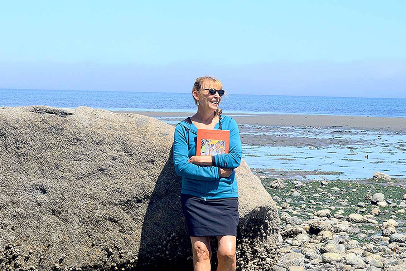 Holly Hughes, editor of “The Madrona Project: Voices from the Heart of Cascadia,” visited Port Townsend’s Chetzemoka Park on Monday. She’s organized two in-person readings from the book in Chimacum and Sequim this month. (Diane Urbani de la Paz/Peninsula Daily News)