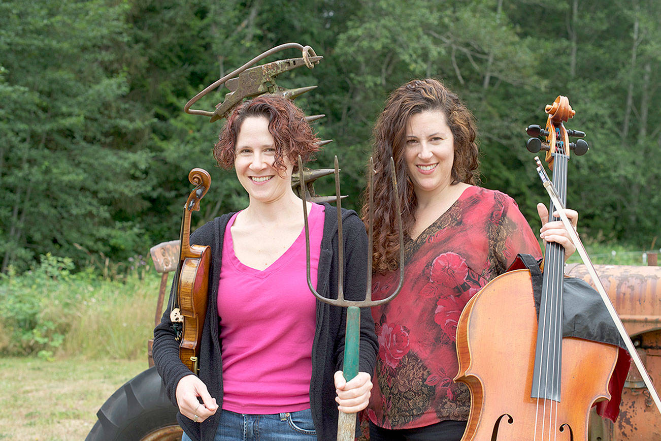 On a farm in Quilcene, the free Concerts in the Barn series will present classical music performances this summer, including Seattle Symphony violinist Elisa Barston, left, and her sister Amy Sue Barston, a cellist, on July 31 and Aug. 1. With pianist Jessica Choe joining them, the Barstons will become Trio Hava, performing music of Lily Boulanger, Ludvig van Beethoven and Johannes Brahms.   photo courtesy Concerts in the Barn
