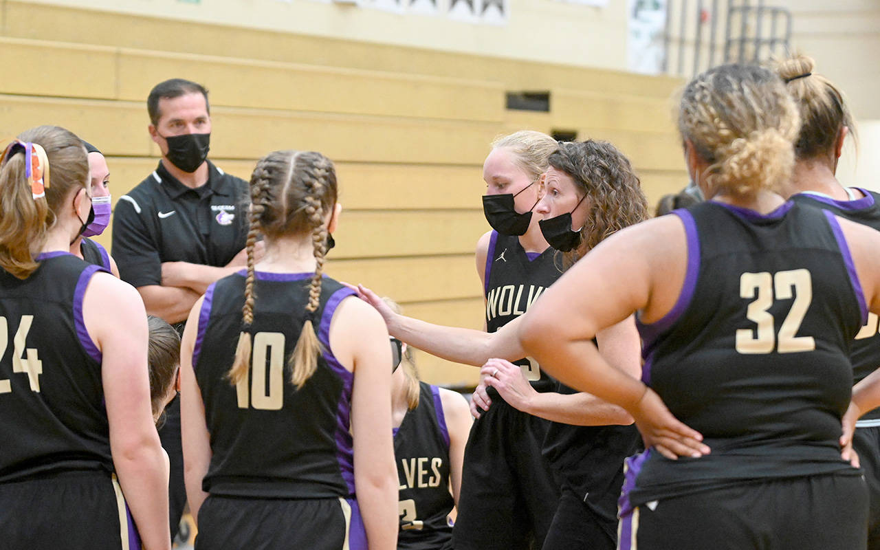 Sequim girls basketball head coach Linsay Rapelje, at right, has stepped down from the position after leading the team to a state tournament berth and a 43-17 record over the last three seasons. (Michael Dashiell/Olympic Peninsula News Group)