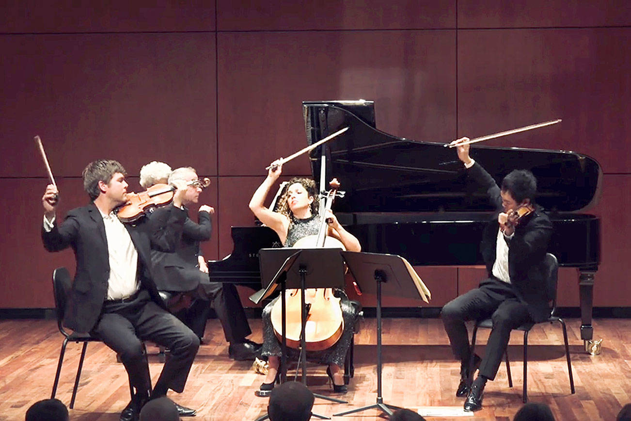 Music on the Strait cofounders James Garlick, left, and Richard O’Neill, right, perform with New York City-based pianist Jeremy Denk and Southern California cellist Ani Aznavoorian, center, in the inaugural festival three years ago at Peninsula College’s Maier Performance Hall. The performers will reunite this August for the 2021 Music on the Strait. (Photo courtesy of Music on the Strait)