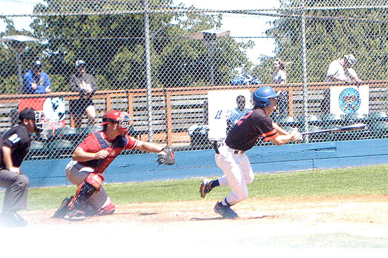 Pierre LaBossiere/Peninsula Daily News
Nick Oakley for the Port Angeles Lefties bunts for a first-inning single against the Walla Walla Sweets on Sunday. Catching for Walla Walla is Colin Watterau.