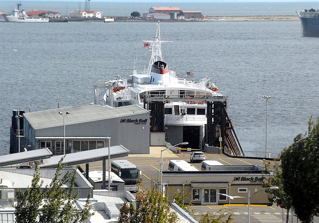 The ferry MV Coho sits idle at the Black Ball dock in Port Angeles on Wednesday, awaiting an opportunity to resume service to Victoria when the U.S.-Canada border reopens to non-essential travel. (Keith Thorpe/Peninsula Daily News)